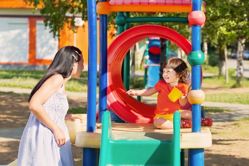 Stop by a park after you pick your kids up from summer daycare to spend some fun time together.